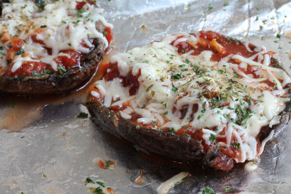 low fat portabella pizza on a baking sheet