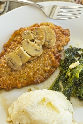 delicious chicken marsala with mashed potatoes and spinach