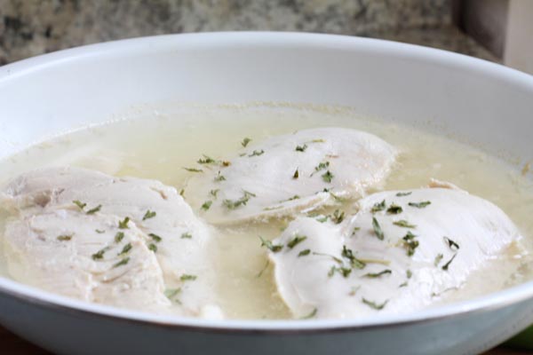 cooking chicken breasts for the chicken parmesan