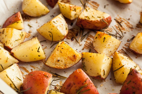roasted red potatoes on a cookie sheet