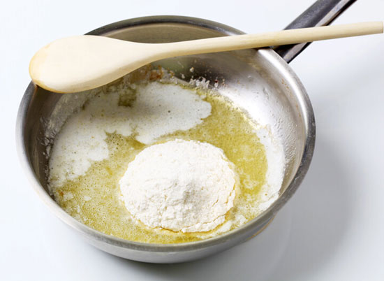 four and butter in pan